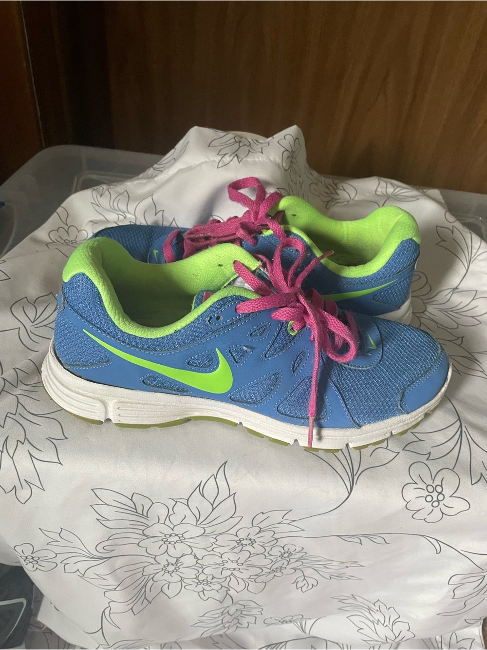 Nike Women’s Blue Running Shoes with Lime Accents and Pink Laces